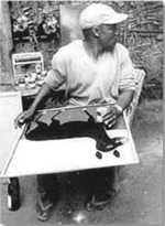 Edward Saidi Tingatinga at his studio